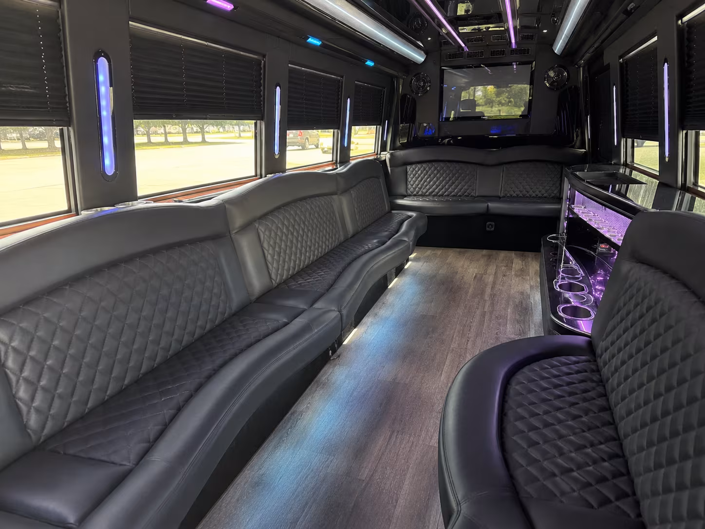 Group beside a Mercedes Sprinter limo in Riverside