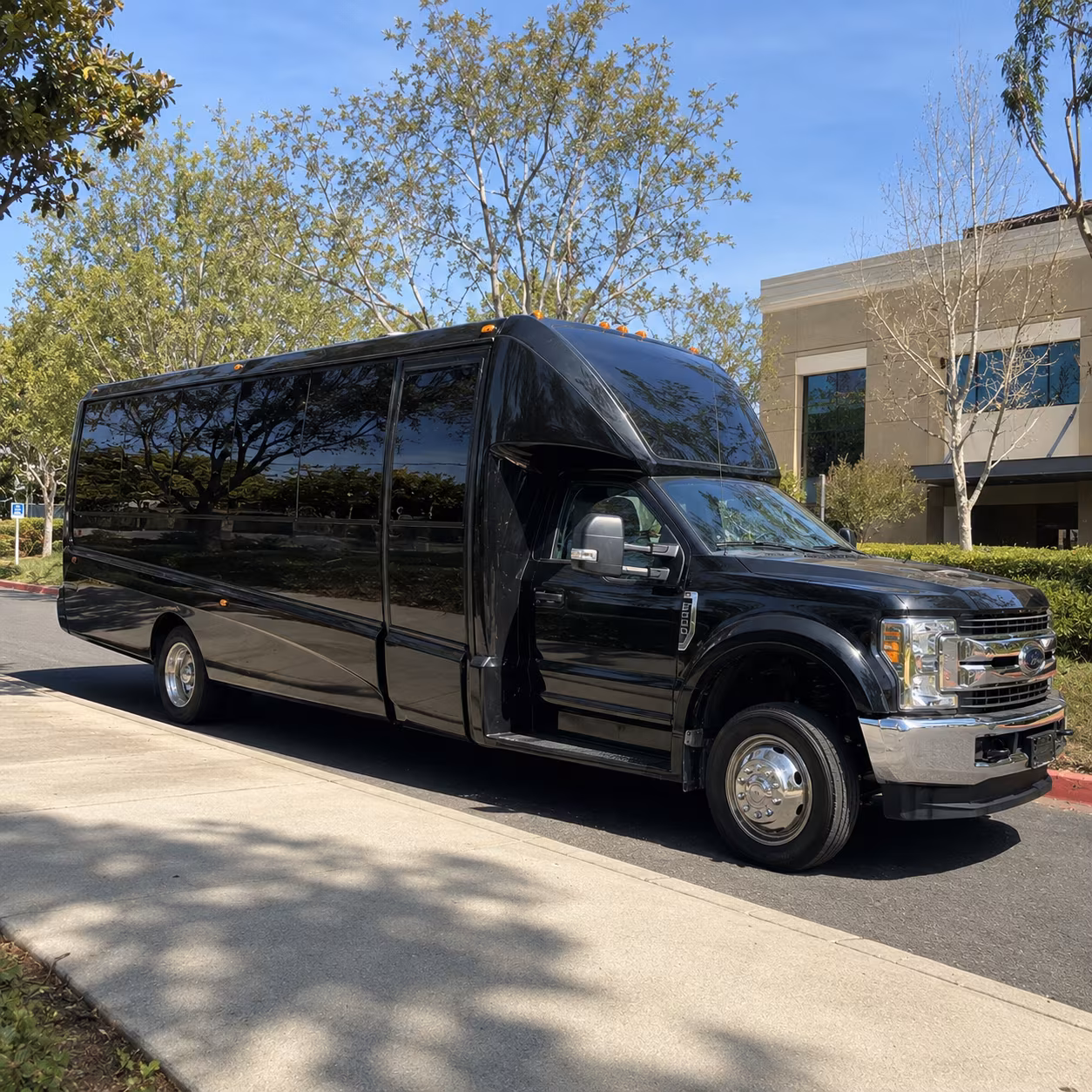 Wedding guests seated inside a party bus serving Riverside
